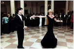 Britain's Princess Diana dances with actor John Travolta at a White House dinner on November 9, 1985.