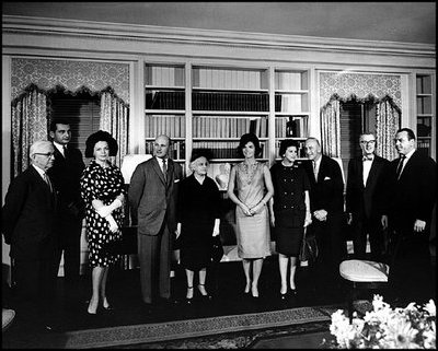 Jacqueline Kennedy gives a tour of the newly-refurbished White House Library June 21, 1962. Mrs. Kennedy also gave a televised tour for her historic redecoration of the State Floor of the White House.