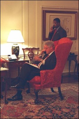 President William Clinton makes a phone call from the historic Map Room. The Map Room was created during World War II as Franklin Roosevelt’s War Room. 