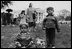 Children enjoy eggs and goodies from the Easter Egg Roll in 1953, the year President Eisenhower reintroduced this tradition to a whole generation of children had never experienced it. From 1942 to 1953, the Easter Egg Roll had it longest hiatus due to World War II, followed by a White House renovation. 