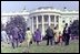 Two little girls play with real colored Easter eggs at the 1967 White House Easter Egg Roll on the South Lawn. While plastic eggs were used in 1975, the use of real eggs returned soon after in 1977.