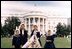 Children dressed in bunny ears pose at the 1961 annual White House Easter Egg Roll.