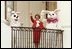 Former First Lady Nancy Reagan and two Easter bunnies wave from the south portico of the White House. In 1981, Nancy Reagan introduced the egg hunt and autographed souvenir wooden eggs to the White House Easter Egg Roll. 