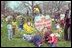 Children pose with a clown and decorations at the 1980 White House Easter Egg Roll. In 1980, Rosalynn Carter passed out 10,000 souvenir plastic eggs welcoming visitors with a little message inside.