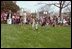 Children participate egg rolling races at the 1980 White House Easter Egg Roll. In 1974, Pat Nixon was the first to introduce organized egg-rolling races to the event. 