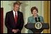 President and Mrs. Bush highlight the importance of early childhood education in an East Room event April 3, 2002. Following their remarks, PBS KIDS characters from Sesame Street, Mr. Rogers' Neighborhood and Between the Lions entertained the audience.