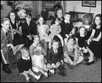  President Franklin Roosevelt poses with his 13 grandchildren on his fourth inaugural, January 20, 1945.