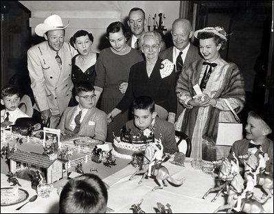 President Dwight Eisenhower's grandson, David, enjoys a Roy Rogers birthday party at the White House in 1956. The Eisenhower grandchildren, David and Susan, were each treated to one "special" or themed birthday party at the White House.