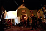 With the Green Room's silk walls in the background, photographer Annie Liebowitz takes Laura Bush's photograph March 20, 2001. In the 1890s, another notable woman photographer, Frances Benjamin Johnston, took photos of the White House interior.