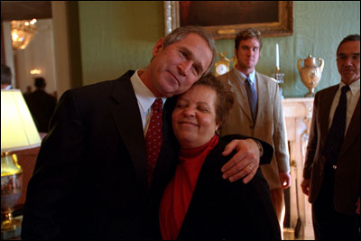 Just two days after his inauguration, President George W. Bush welcomes guests to the White House for a Sunday brunch Jan. 22, 2001. 