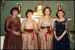 Mamie Eisenhower poses with her sister and two nieces in the Green Room for their debut party November 25, 1960.