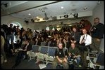 Reporters prepare for a press conference by President Bush in the James S. Brady Press Briefing Room, March 13, 2002. 