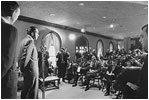 President Richard Nixon talks with reporters in the new Press Briefing Room April 17, 1970. The room was built over the site of Franklin Roosevelt's swimming pool.