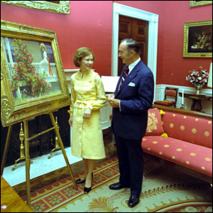 Rosalynn Carter admires a painting in the Red Room with White House Curator Clem Conger September 28, 1977.