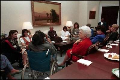 Barbara Bush talks with families of the Iraqi hostages in the Roosevelt Room December 13, 1990.