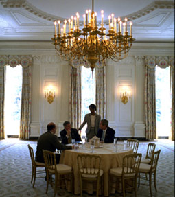 President George W. Bush meets with Chief of Staff Andy Card, National Security Adviser Condoleezza Rice and Press Secretary Ari Fleischer in the State Dining Room before a luncheon in the Blue Room May 2, 2002. Thomas Jefferson used the State Dining Room as his office.