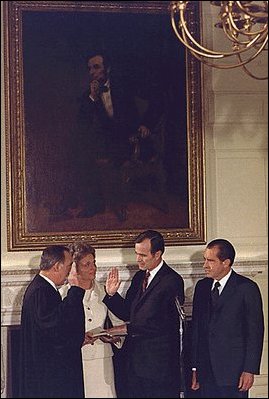 Appointed by then-President Richard Nixon, future President George H.W. Bush is sworn-in as U.S. Representative to the United Nations in the State Dining Room February 26, 1971.