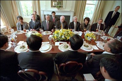 Vice President Dick Cheney hosts a state lunch at the Naval Observatory for Chinese Vice President Hu Jintao May 1, 2002. Photographed with the Vice President, from left to right, are National Security Advisor Dr. Condoleezza Rice, Secretary of Commerce Donald Evans, Secretary of State Colin Powell, Secretary of the Treasury Paul O'Neill, Secretary of Labor Elaine Chao and Deputy Secretary of Defense Paul Wolfowitz. 