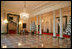 The North Portico of the White House opens up to the Cross Hall lined in fresh Boxwood Garland.