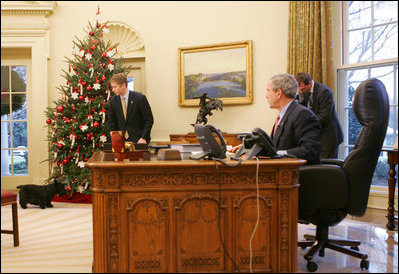 President George W. Bush calls Barney to the Oval Office, Friday, Dec. 1, 2006, to tape their segment for this year's Barney Cam video.