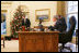 President George W. Bush calls Barney to the Oval Office, Friday, Dec. 1, 2006, to tape their segment for this year's Barney Cam video.