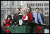 Members of the Botek family of Lehighton, Pa., ride the horse-drawn wagon delivering the official White House Christmas tree Monday, Nov. 27 , 2006, an 18-foot Douglas fir tree donated by the Botek family, owners of the Crystal Springs Tree Farm in Lehighton, Pa. 