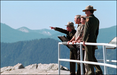 President George W. Bush and former Interior Secretary Gale Norton tour Moro Rock and the surrounding areas in the Sequoia National Park May 30, 2001.