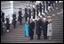 President George W. Bush, Laura Bush, Vice President Dick Cheney, and Lynne Cheney review the troops following the inauguration from the east steps of the U.S. Capitol, Jan. 20, 2001.