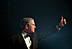 President George W. Bush gives a thumbs-up to the crowd at one of the inaugural balls in Washington D.C., Jan. 20, 2001. 