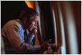 After departing Offutt Air Force Base in Bellevue, Neb., President George W. Bush confers with Vice President Dick Cheney from Air Force One during his flight to Andrews Air Force Base Sept. 11, 2001.