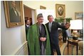 President George W. Bush welcomes then-Chairman of the Afghan Interim Authority Hamid Karzai to the Oval Office Jan. 28, 2002.