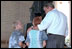 President Bush visited the Jefferson Memorial on July 2, 2001 as part of the beginning of Independence Day celebrations. The President greeted these two boys and other visitors to the memorial dedicated to President Thomas Jefferson, who is credited with drafting the Declaration of Independence. Two days later, President Bush visited Independence Hall in Philadelphia, the site of the adoption of the Declaration of Independence by the Continental Congress on July 4, 1776.