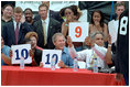 President Bush and Mayor Street help judge a contest at an urban block party in Philadelphia's downtown July 4, 2001.