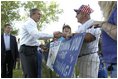 President George W. Bush greets residents of Ripley, West Virginia moments after his arrival on Marine One, July 4. 