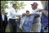 President George W. Bush greets residents of Ripley, West Virginia moments after his arrival on Marine One, July 4. 