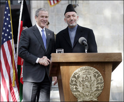 President George W. Bush and President Hamid Karzai of Afghanistan appear together Wednesday, March 1, 2006 at a joint news conference at the Presidential Palace in Kabul, Afganistan.