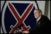 President George W. Bush addresses U.S. and Coalition troops Wednesday, March 1, 2006, during a stopover at Bagram Air Base in Afghanistan, prior to his visit to India and Pakistan.