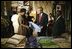 President George W. Bush participates in a tour of the Southern Africa Global Competitiveness Hub with President Festus Gontebanye Mogae of Botswana Thursday, July 10, 2003. White House photo by Paul Morse