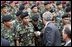 President George W. Bush greets Thai troops after his remarks at the Royal Thai Army Headquarters in Bangkok, Thailand, Sunday, Oct. 19, 2003. White House photo by Paul Morse