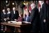 President George W. Bush and Laura Bush greet Parliament officials and sign guest books in the rotunda of Parliament Hill in Ottawa, Canada, Nov. 30, 2004. 