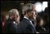 President George W. Bush and Canadian Prime Minister Paul Martin answer questions from the media during a joint press availability in the Lester B. Pearson Building during his two-day trip to Ottawa, Canada, Nov. 30, 2004. 