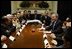 President George W. Bush meets with Iraqi Fulbright Scholars in the Roosevelt Room, Feb. 3, 2004.