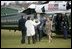 President George W. Bush and Mrs. Laura Bush arrive at Prime Minister Tony Blair and Mrs. Blair's home, Myrobella House, Trimdon Station. White House photo by Eric Draper