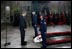 President George W. Bush bows his head in silence as a wreath is laid at the Tomb of the Unknown Warrior at Westminster Abbey in London Thursday, Nov. 20, 2003. White House photo by Eric Draper