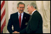 During the meetings, Czech Republic President Vaclav Havel and President George W. Bush take a break to look over the capital city from Prague Castle in Prague, Czech Republic, Nov. 20, 2002. White House photo by Eric Draper