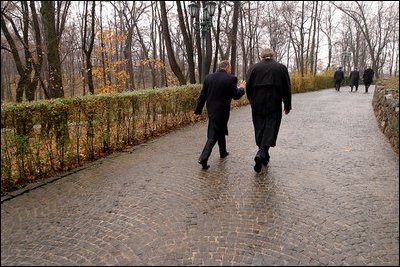 President Bush walks alone with Romanian President Iliescu on the grounds of Cotroceni Palace in Bucharest, Romania, Nov. 23, 2002. White House photo by Paul Morse