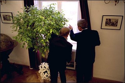 During the meetings, Czech Republic President Vaclav Havel and President George W. Bush take a break to look over the capital city from Prague Castle in Prague, Czech Republic, Nov. 20, 2002. White House photo by Eric Draper