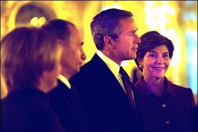 President and Mrs. Bush stand with Russian President Vladimir Putin and his wife as they begin a brief tour of Catherine's Palace outside St. Petersburg, Russia Friday, Nov. 22, 2002. White House photo by Susan Sterner.