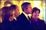 President and Mrs. Bush stand with Russian President Vladimir Putin and his wife as they begin a brief tour of Catherine's Palace outside St. Petersburg, Russia Friday, Nov. 22, 2002. White House photo by Susan Sterner.