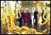 Laura Bush and Ludmila Putin, wife of Russian President Valdimir Putin, are reflected in a gilded mirror as they walk through one of the great halls of Catherine's Palace outside St. Petersburg, Russia. White House photo by Susan Sterner.